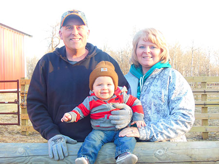 Ernie and Linda Johnson with grandson, Jett